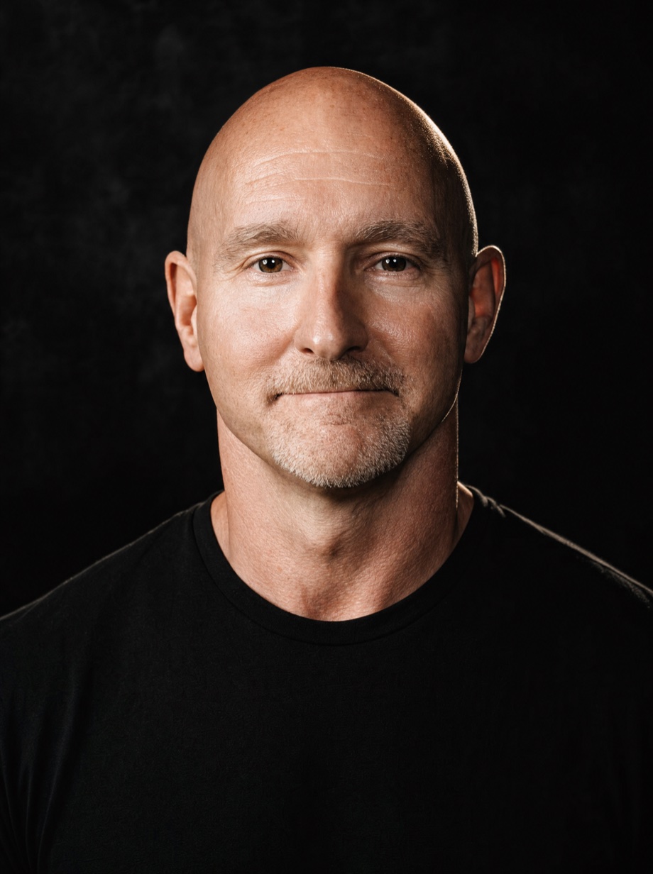 Chance Potts in a black shirt against a dark background